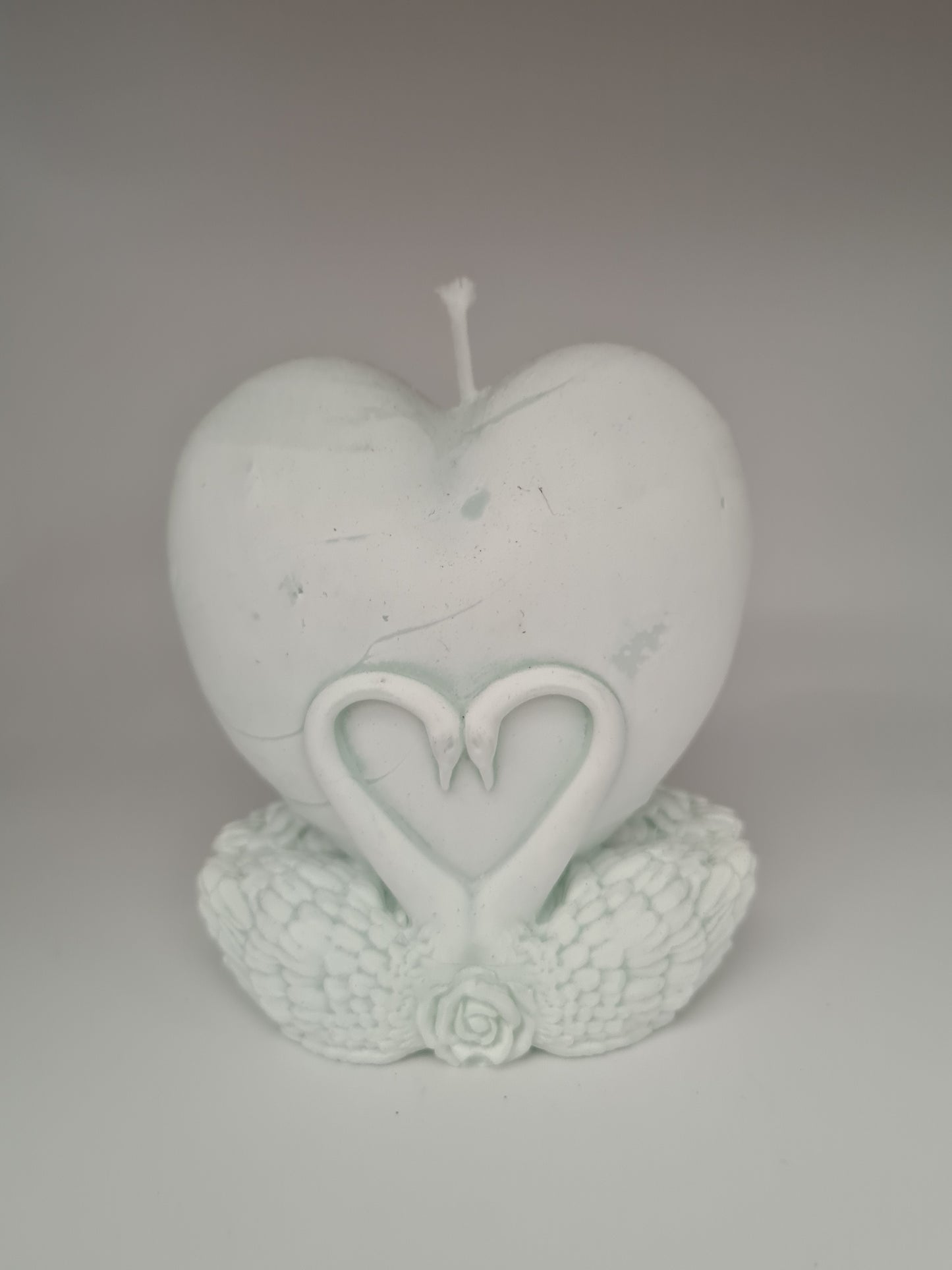 Grijs hartje met zwanen