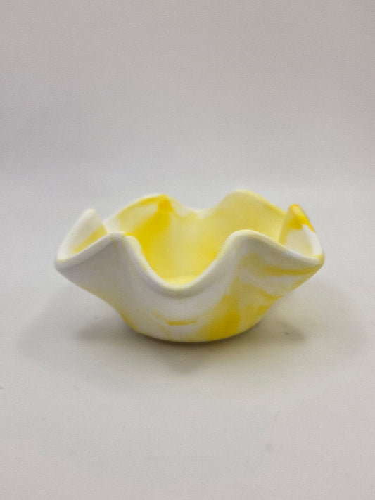 Gele theelichthouder